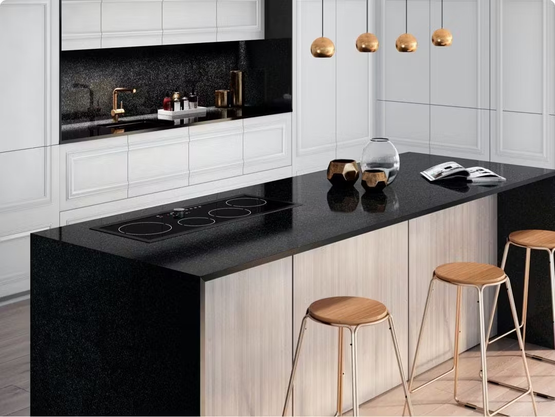 Black granite with metal stove and white cupboards