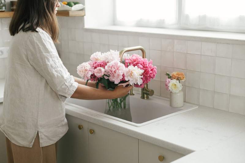 sink-with-brass-faucet-and-granite-countertop